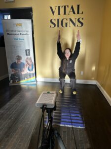 Client performing a Vital Signs movement assessment